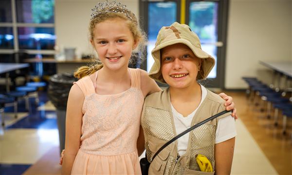 Two girls smile